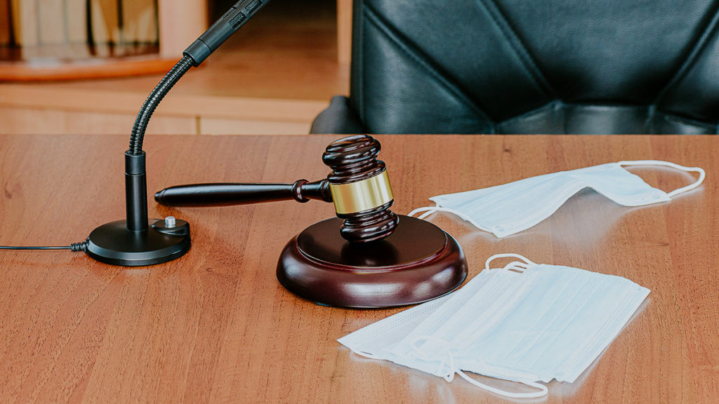 covid masks on courtroom table